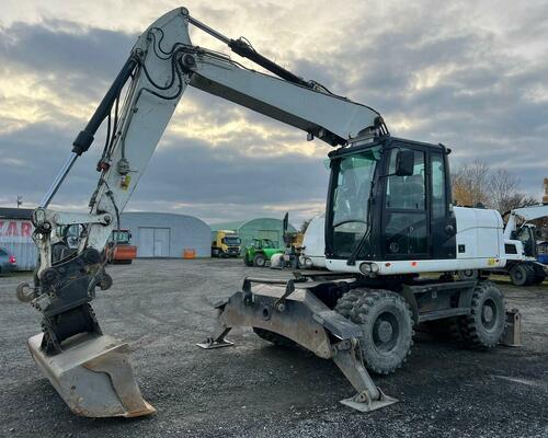CATERPILLAR  M 313 D-STROJ V SUPER STAVU 