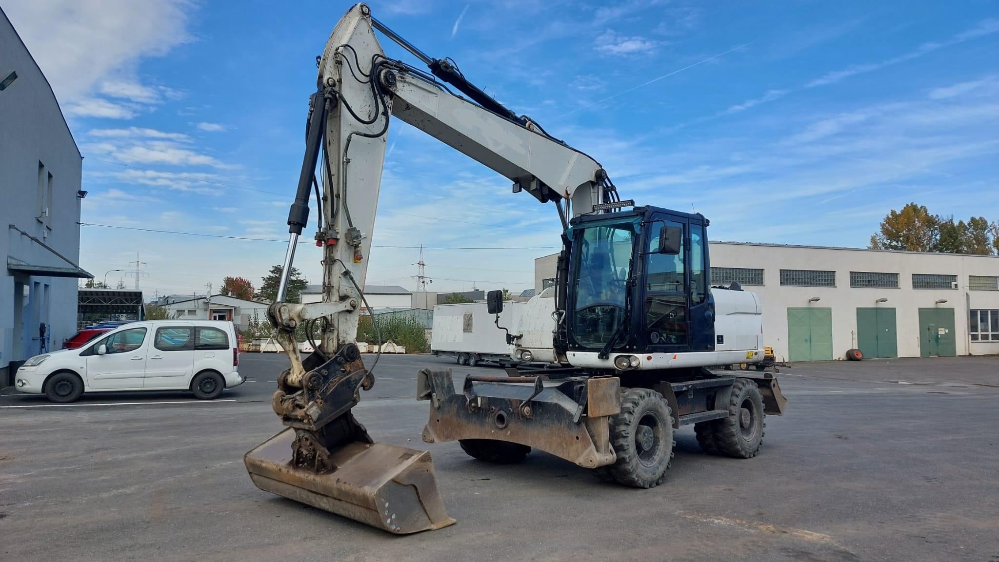 CATERPILLAR  M 313 D-STROJ V SUPER STAVU 