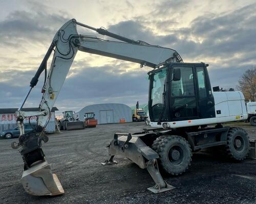 CATERPILLAR  M 313 D - STROJ V SUPER STAVU 