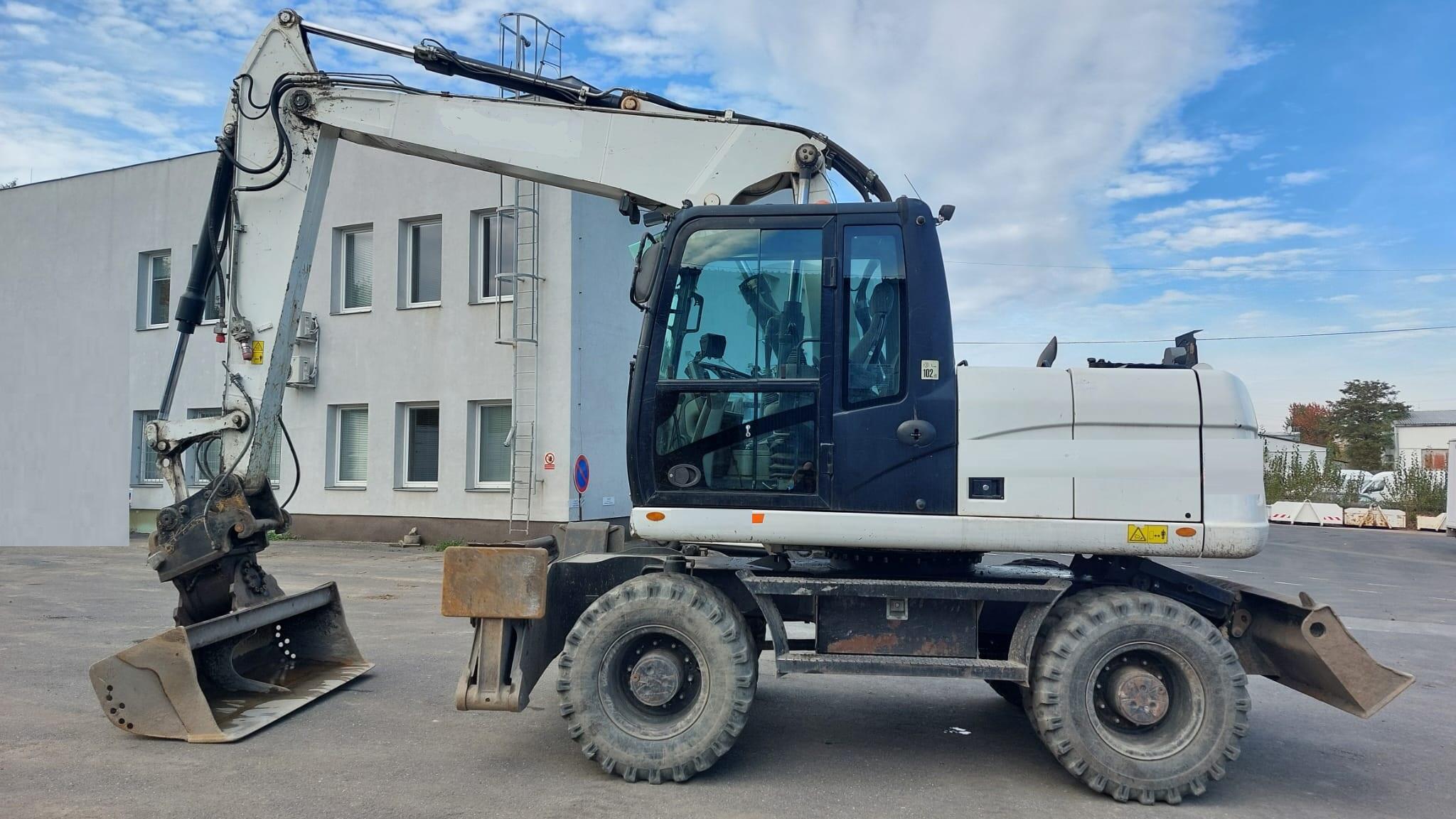 KOLOVÉ RÝPADLO CATERPILLAR M 313 D- STROJ V SUPER STAVU 
