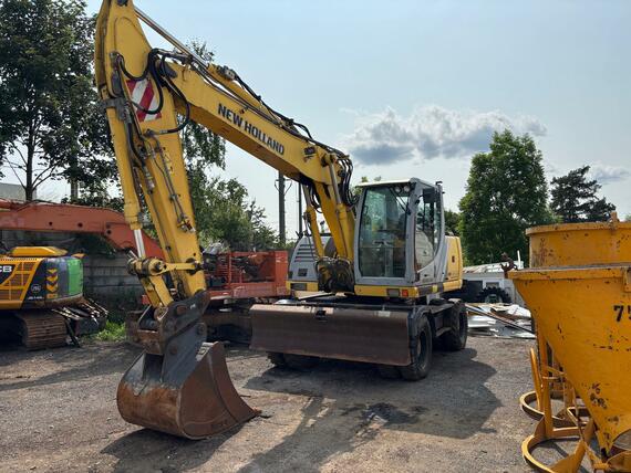 Kolové rypadlo / nakladač New Holland MH CITY 16T