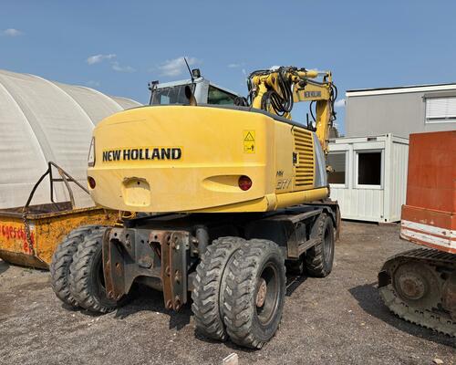 Kolové rypadlo / nakladač New Holland MH CITY 16T