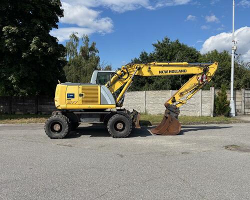 Kolové rypadlo / nakladač New Holland MH CITY 16T
