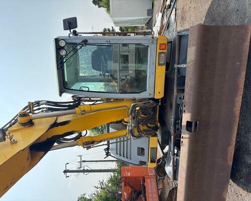 Kolové rypadlo / nakladač New Holland MH CITY 16T