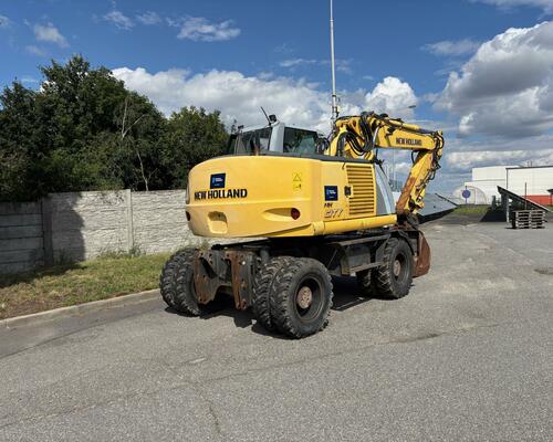 Kolové rypadlo / nakladač New Holland MH CITY 16T