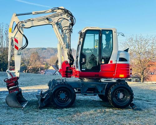 Kolové rypadlo Takeuchi TB295W (Možnost leasingu)