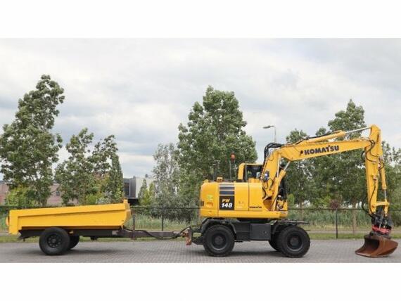 Komatsu PW 148 + Gigant trailer Komatsu PW 148 + Gigant trailer