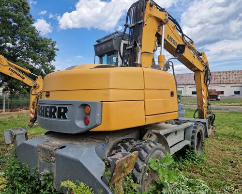 LIEBHERR 312 kolový bagr LIEBHERR A312