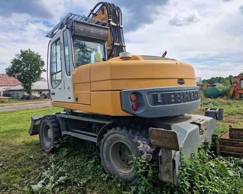 LIEBHERR 312 kolový bagr LIEBHERR A312