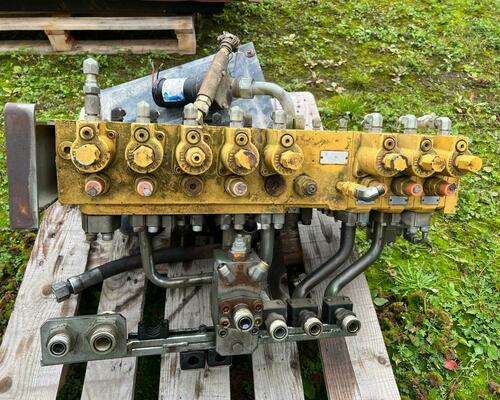 Náhradní díly na kolové rýpadlo CAT M 315