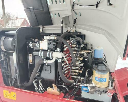 Takeuchi TB260 Powertilt, Centrální mazání