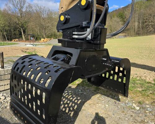 Demoliční - třídící drapák Caterpillar r.v. 2018