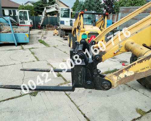 Predný mechanický rýchloupínač traktorbáger Komatsu WB