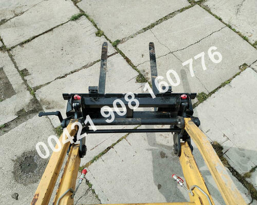 Predný mechanický rýchloupínač traktorbáger Komatsu WB
