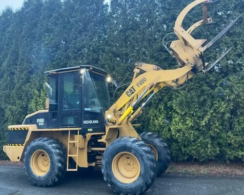Kolový nakladač CAT 910 G