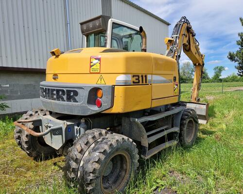 LIEBHERR 311 kolový bagr LIEBHERR A311