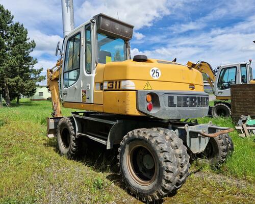 LIEBHERR 311 kolový bagr LIEBHERR A311