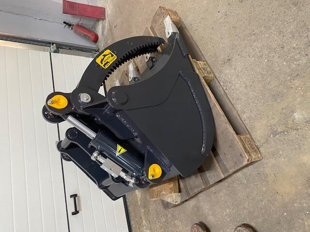 Lyžica s hydraulickým palcom pre traktor-bagre - pridržiavač