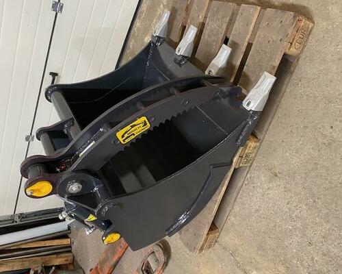 Lyžica s hydraulickým palcom pre traktor-bagre - pridržiavač