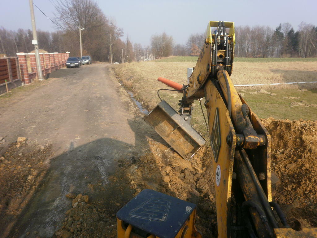 Re: Svahová lopata pro traktorbagr JCB