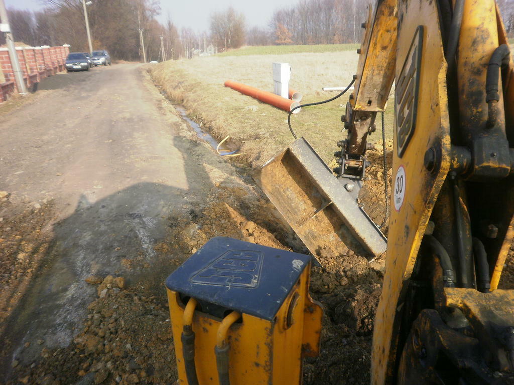 Re: Svahová lopata pro traktorbagr JCB
