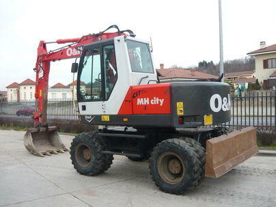 Re: Kolový bagr New Holland MH city 