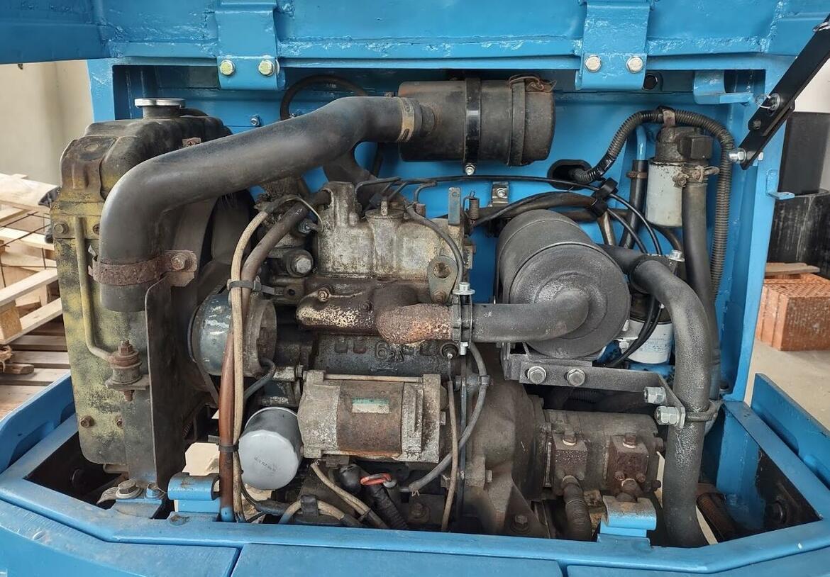 Re: Manuály Kubota KH-012