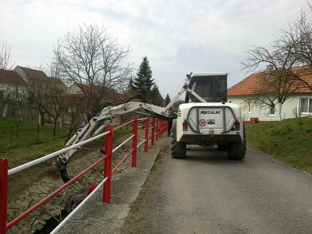 Re: Mecalac 12 MXT