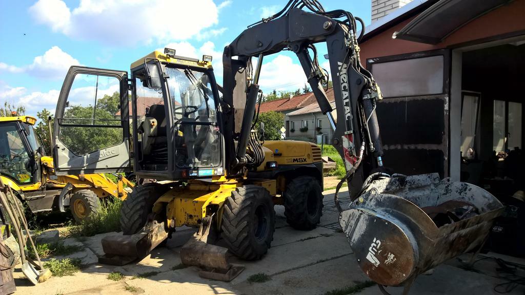 Re: Mecalac 12 MXT
