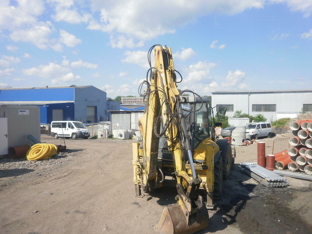 Re: New Holland LB115.B