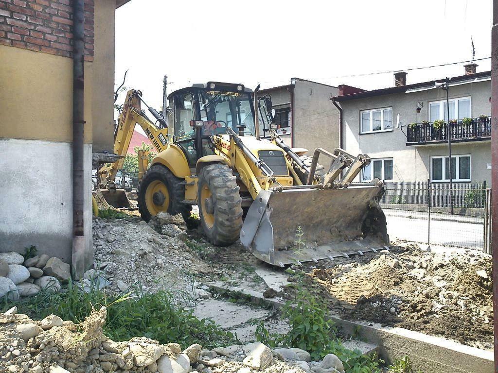 Re: New Holland LB115.B