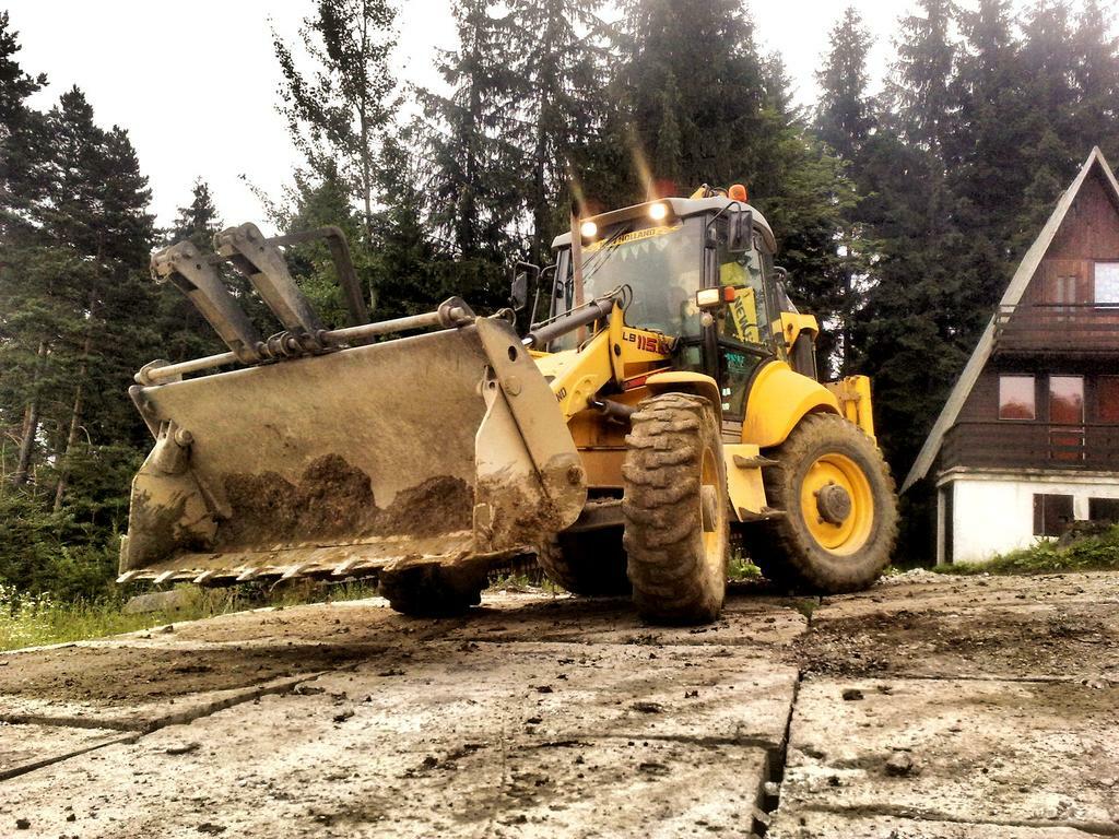 Re: New Holland LB115.B