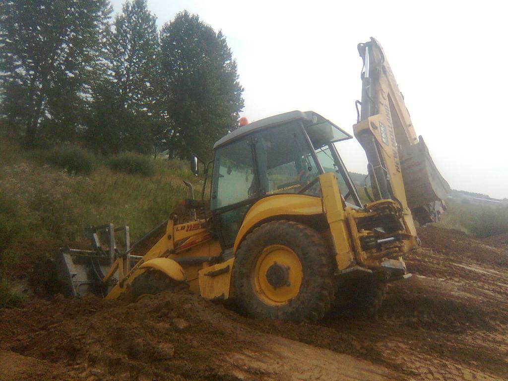 Re: New Holland LB115.B