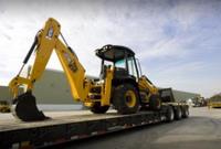 Firma JCB přichází s humanitární pomocí pro Haiti